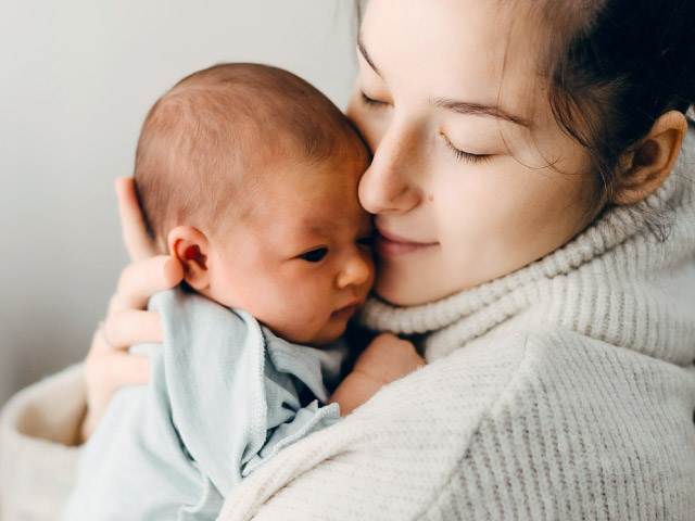 Mother Holding a Baby